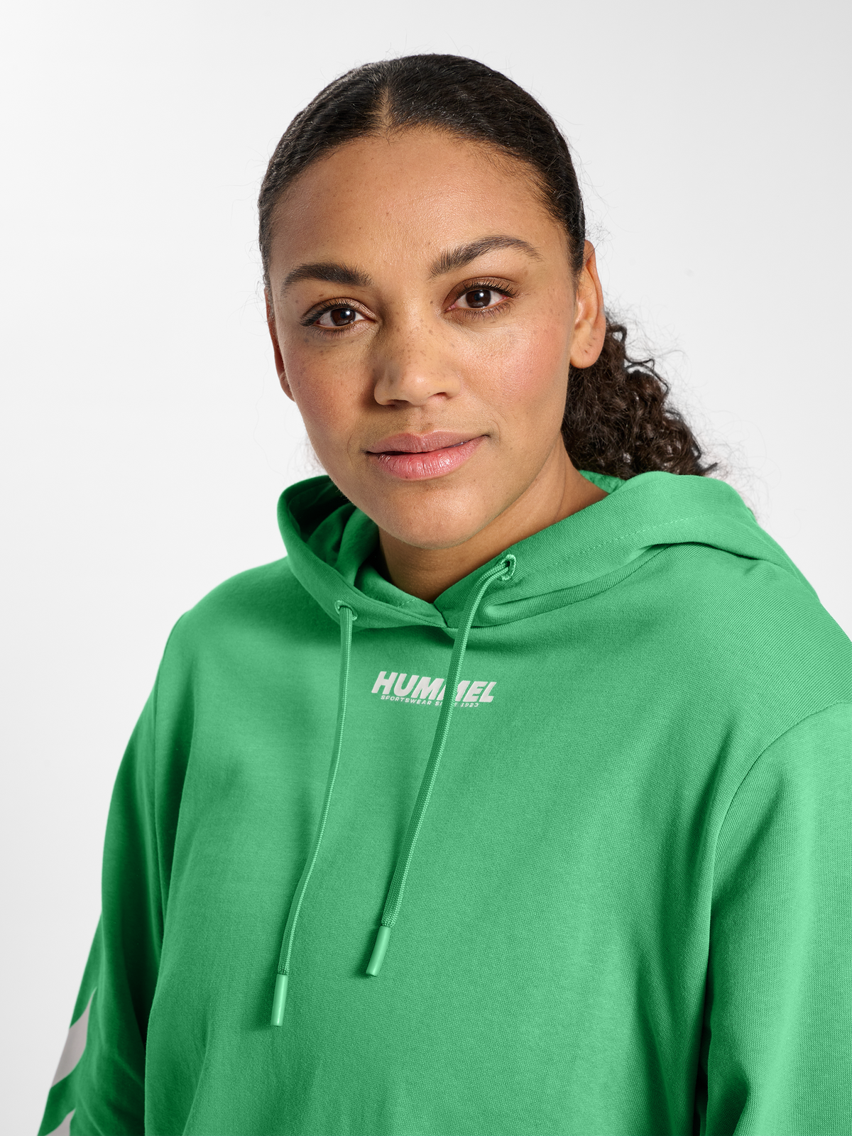 hmlLEGACY WOMAN HOODIE PLUS