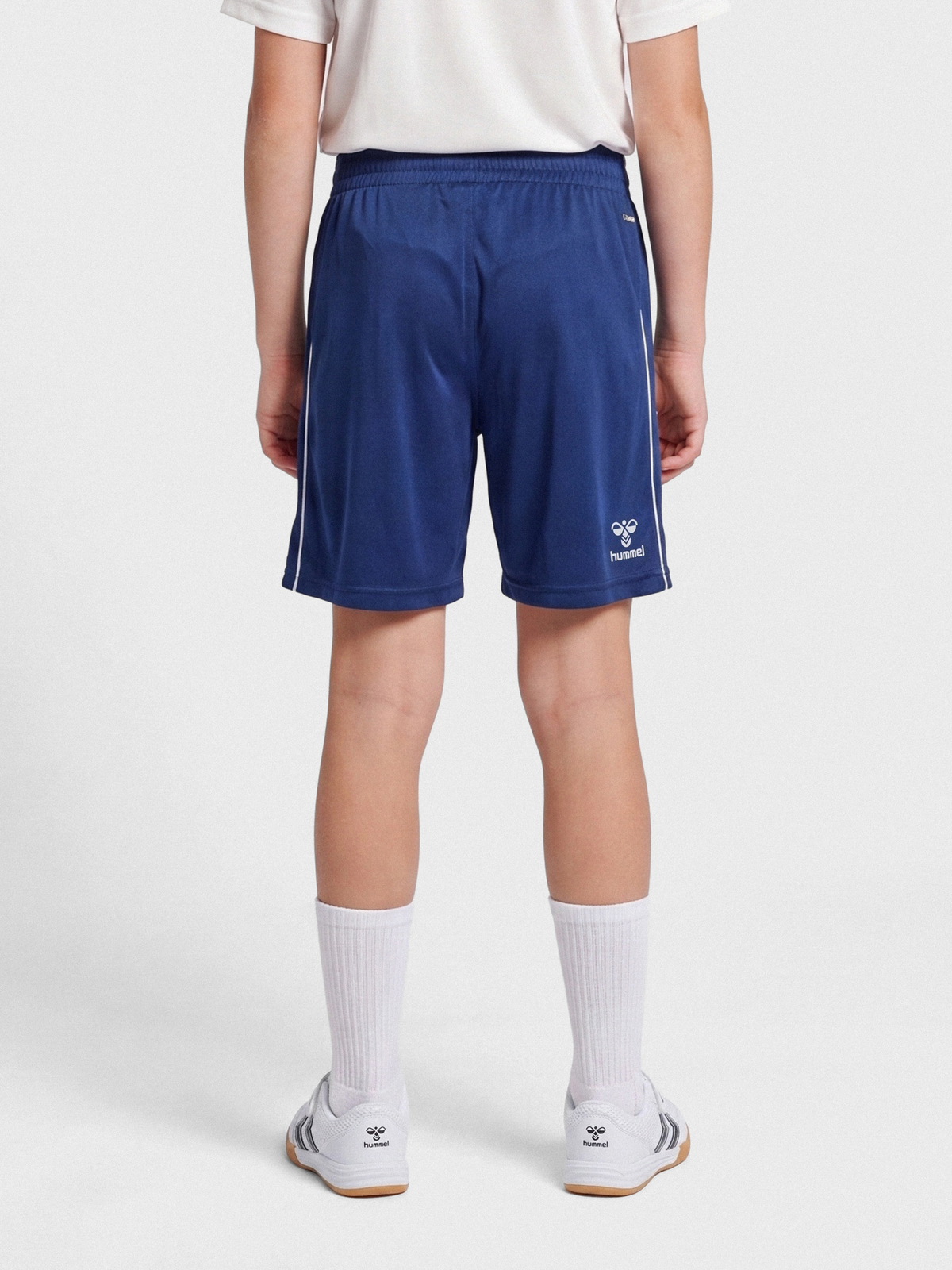 hmlCORE XK POLY COACH SHORTS KIDS
