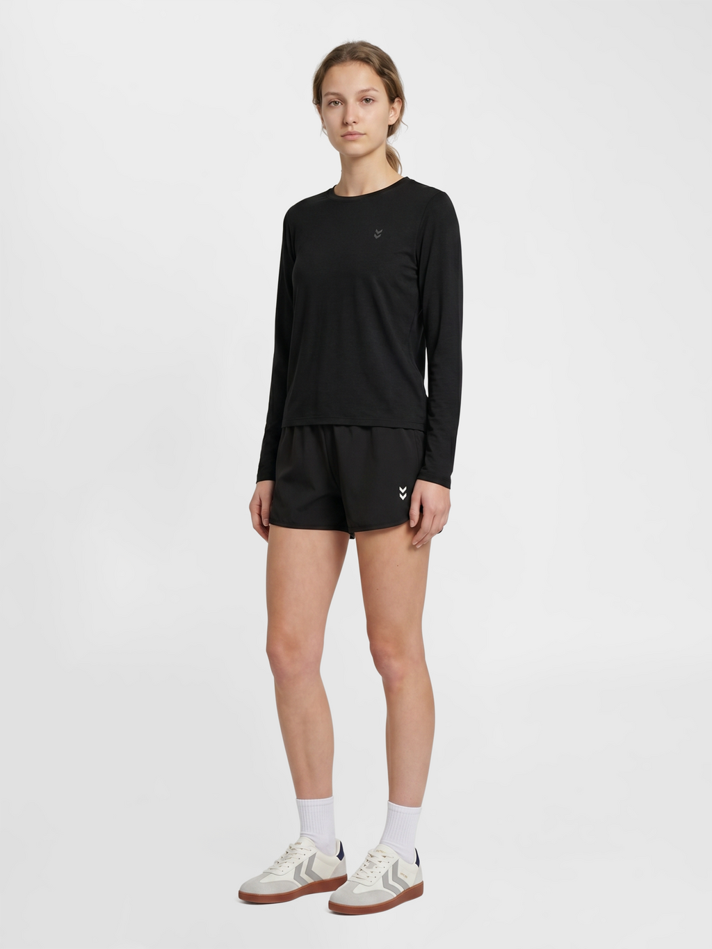 hmlTRAINING W CURVED SHORTS