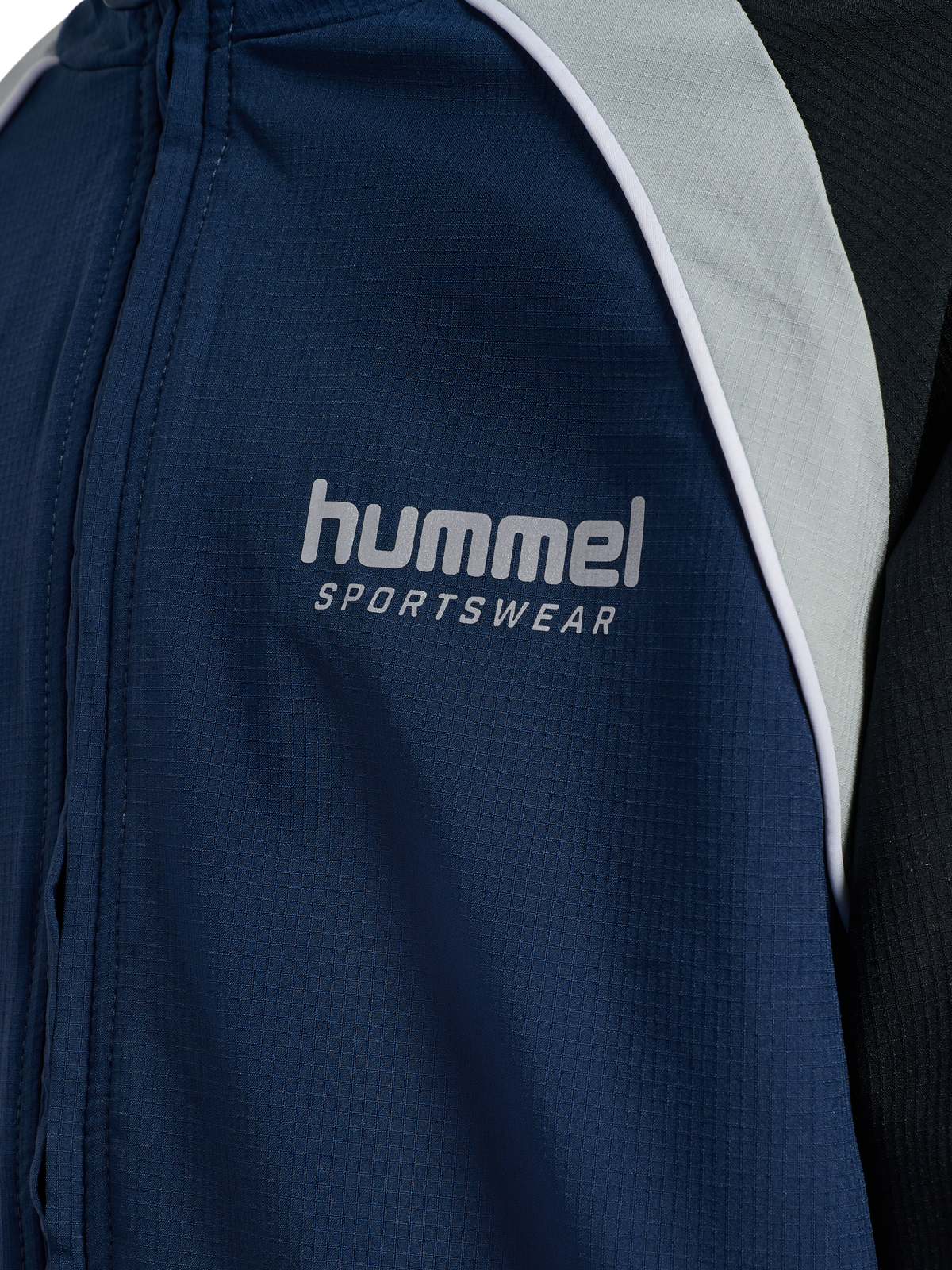 hmlJR LOOSE TRACKSUIT ZIP JACKET